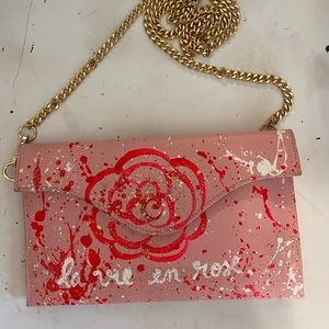 Anca Barbu pink clutch